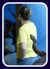 lady with snake behind her